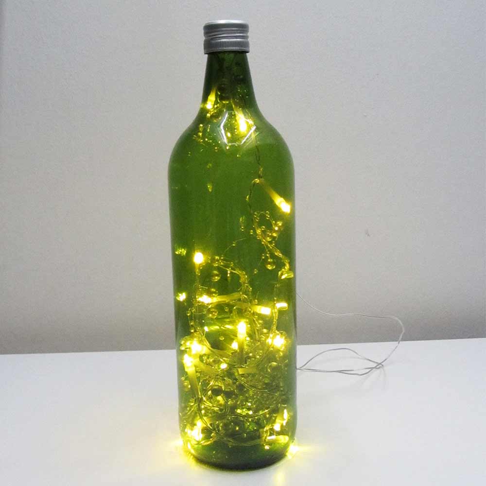 I was a bottle: Glas-Flaschen - Lampen und Leuchten, Laternen, Gläser, Vasen und Schalen aus Glas, Led-Flaschenlampen: Led Flaschenlampe mit Perlenleds und goldgrünem Licht