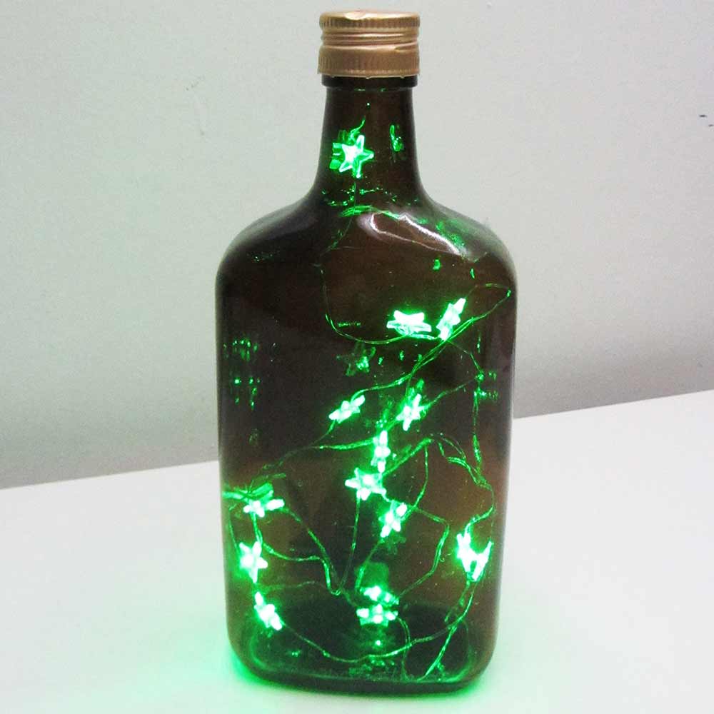 I was a bottle: Glas-Flaschen - Lampen und Leuchten, Laternen, Gläser, Vasen und Schalen aus Glas, Led-Flaschenlampen: braune Rum Flaschenlampe mit grünem Sternen-Ledlicht
