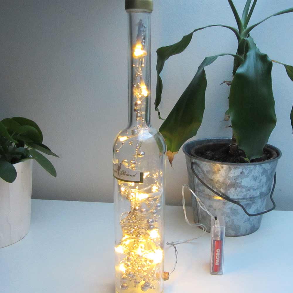 I was a bottle: Glas-Flaschen - Lampen und Leuchten, Laternen, Gläser, Vasen und Schalen aus Glas, Led-Flaschenlampen: Venediger Brand Flaschenlampe mit goldgelbem Perlen-Ledlicht