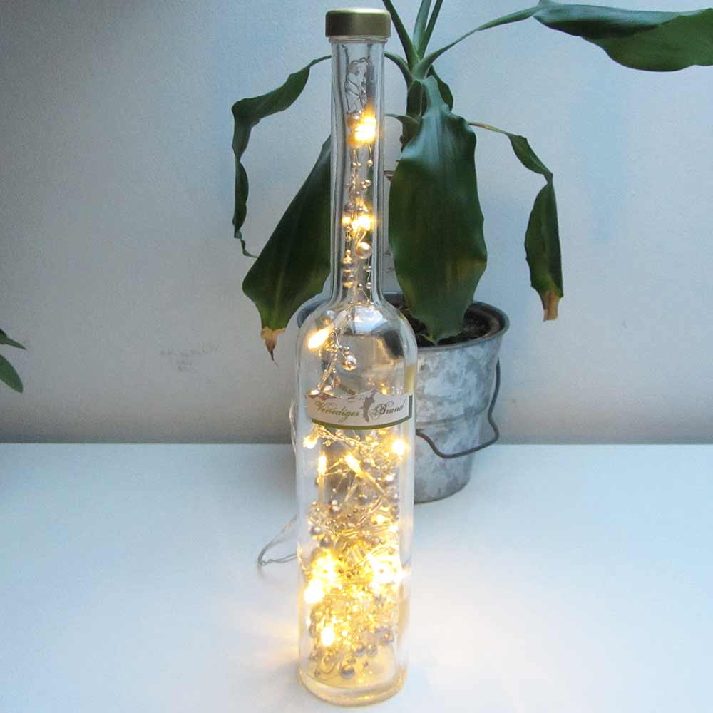 I was a bottle: Glas-Flaschen - Lampen und Leuchten, Laternen, Gläser, Vasen und Schalen aus Glas, Led-Flaschenlampen: Venediger Brand Flaschenlampe mit goldgelbem Perlen-Ledlicht