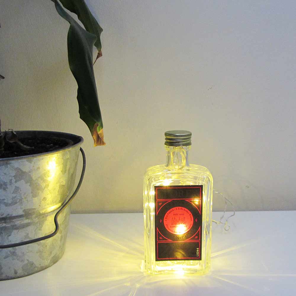 I was a bottle: Glas-Flaschen - Lampen und Leuchten, Laternen, Gläser, Vasen und Schalen aus Glas, Led-Flaschenlampen: kleine Sporer Orangen Punsch Flaschenlampe mit goldgelbem Licht